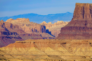 AERIAL: Flying over the sandstone formations in Utah on a sunny winter day.