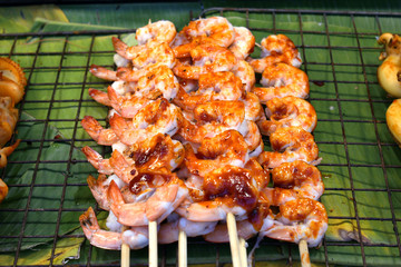 Grilled sea shrimps that are sold as street food in bangkok thailand