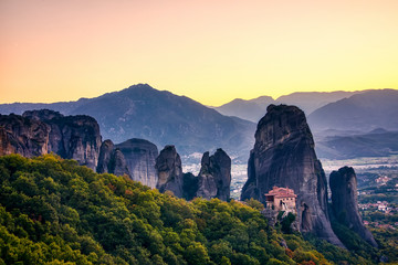 Fototapeta na wymiar Landscape with monasteries and rock formations in Meteora, Greece. during sunset.