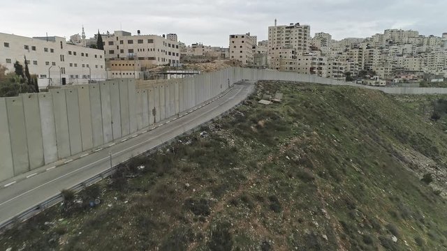Aerial footage of the separation wall between Israel and the Palestinian Authority in Jerusalem