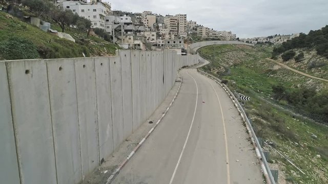 Aerial footage of the separation wall between Israel and the Palestinian Authority in Jerusalem