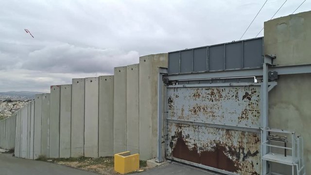 Aerial footage of the separation wall between Israel and the Palestinian Authority in Jerusalem