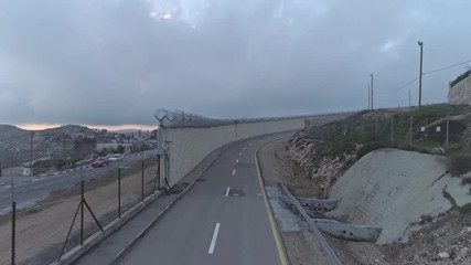 Aerial footage of the separation wall between Israel and the Palestinian Authority in Jerusalem