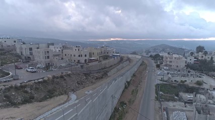 Aerial footage of the separation wall between Israel and the Palestinian Authority in Jerusalem