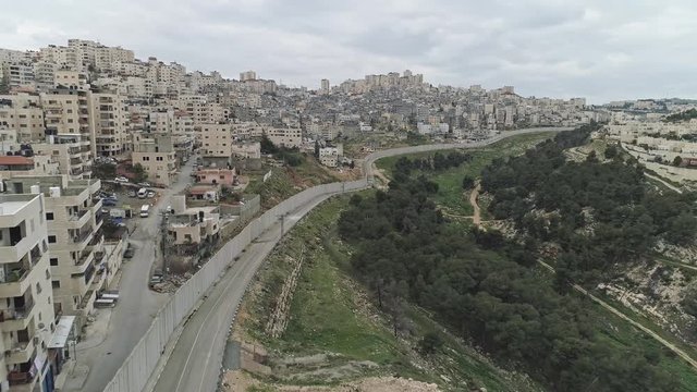 Aerial footage of the separation wall between Israel and the Palestinian Authority in Jerusalem