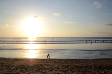 Dramatic sunset at Kuta beach in Bali