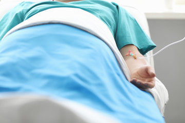 Fototapeta premium Man with IV in hospital