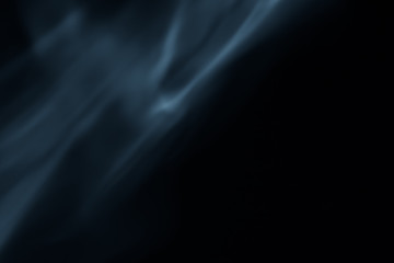 Soft blur flame go up to the top on left side on black background. For overlay effect - process in blue graphic style