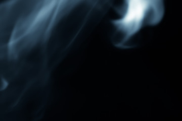 Fototapeta premium Soft blur flame go up to the top on left side on black background. For overlay effect - process in blue graphic style