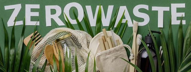 Zero waste concept. Cotton bag, bamboo cultery, glass jar, bamboo toothbrushes, hairbrush and...