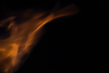Soft blur flame with soft detail moving curve on black background. For overlay effect