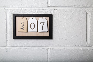 Wall Hanging Calendar in a Picture Frame Showing January 7