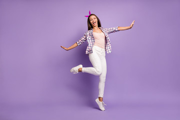Fototapeta na wymiar Full body photo of funky girl have spring weekends enjoy hold hands like planes feel rejoice wear retro style outfit isolated over purple color background