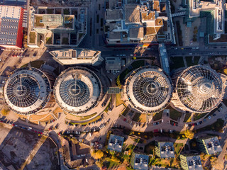 Beautiful drone shot of Old Gasometer buidlings in Vienna from up above. Used like gasholders, it is music hall, museum, dormitory and shopping center howadays
