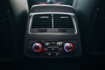 Obraz na płótnie Canvas Car rear seats row air conditioning control