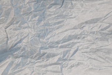 Crumpled paper texture, abstract background. Fashionable modern shade. Copy space, soft focus.