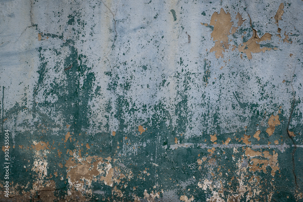 Aufkleber Old and worn out wall background with paint peeling off , Grunge texture of building in a state of disrepair or ruin as a result of age or neglect