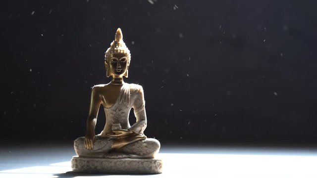 Wind blowing on buddha statue