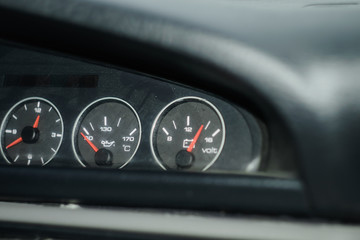 dashboard in a car, speedometer, tachometer