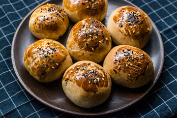 Homemade Turkish Pastries Pogaca with Black Cumin and Sesame Seeds.