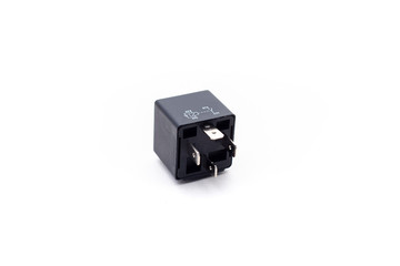 Car electric relay switch on isolated white background. Car electric spare part.