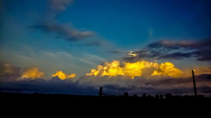 Attractive photo of Sunrise with Golden Cotton Clouds