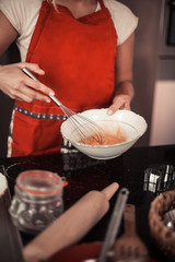 Beautiful family bake christmas cookies. Family cooks in the kitchen. Holidays. Christmas. New Year. Cozy.