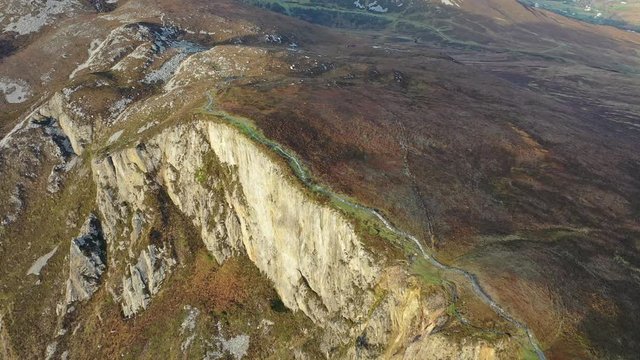 Aerial of Slieve League Cliffs are among the highest sea cliffs in Europe rising 1972 feet or 601 meters above the Atlantic Ocean - County Donegal, Ireland
