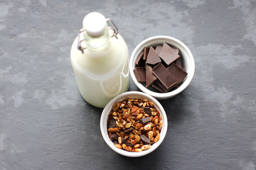 Bowl of homemade granola with yogurt and fresh berries
