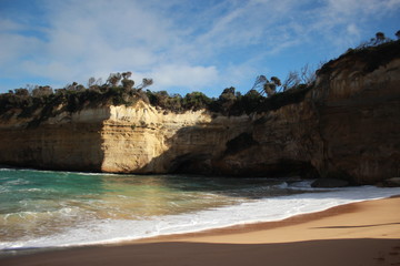  wild winter waves crashing against iconic Australian sandstone rock formations, the twelve apostles, great ocean road, Southern Victorian Coast