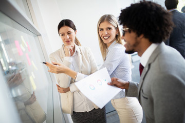 Business people working discussing as a team at the office