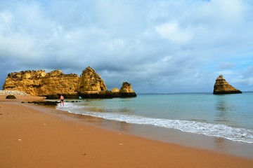 rocky beach in Lagos - Portugal on a cloudy day