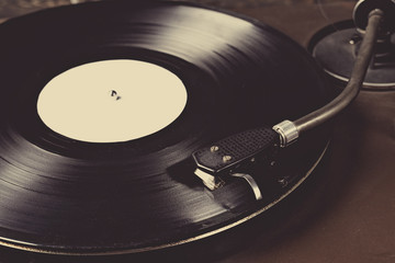 old turntable, black vinyl records, top view