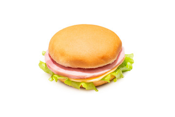 Sandwich with ham, cheese, lettuce on white background.