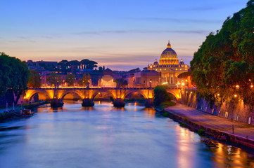 Fototapeta na wymiar Wonderful view of St Peter Cathedral, Rome, Italy. Sunset light.