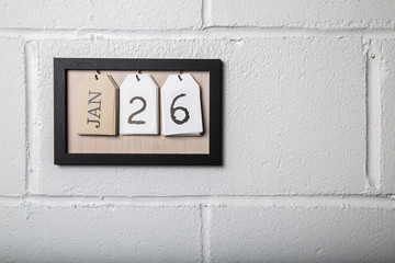 Wall Hanging Calendar in a Picture Frame Showing January 26