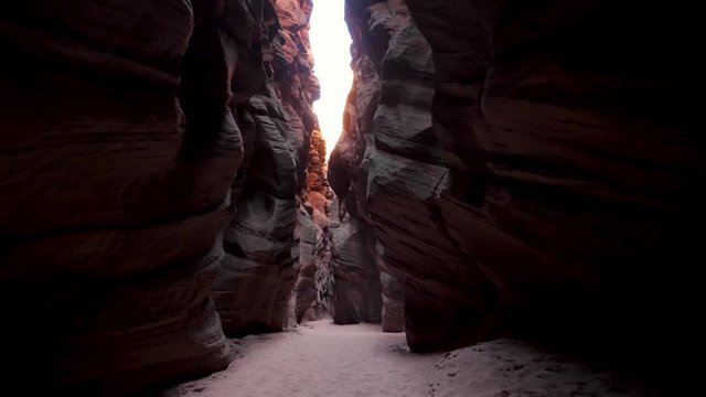Camera Movement In Deep Slot Canyon With Wavy And Smooth Sandstone Walls