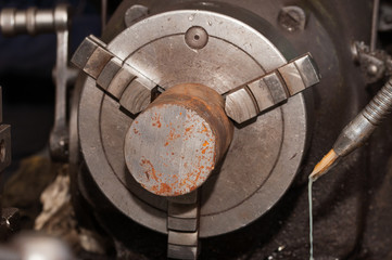 Metal processing by lathe machine. cutting tool at mechanical turning metal working