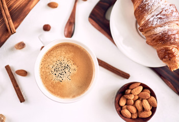cup of fresh espresso on table, top view