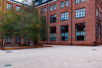 Modern urban architecture; reconstruction of buildings of the old factory complex; brick walls and...