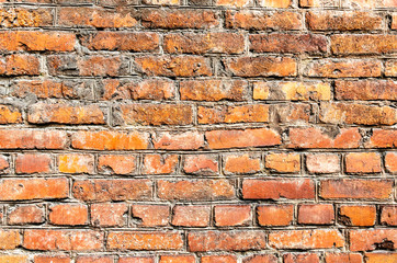 Obraz premium Rough red brick wall as background texture
