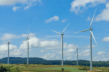 Fototapeta premium Wind turbines generating electricity with sky background,from wind power for environmental,Clean energy