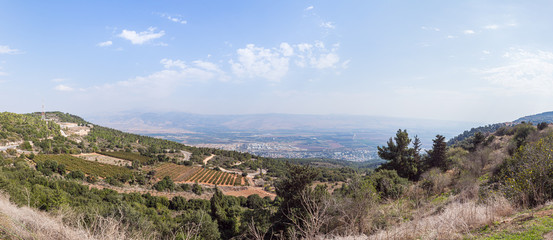 Fototapeta na wymiar Panoramic view from the mountain near the Israeli Margaliot village to the valley in the Upper Galilee in northern Israel