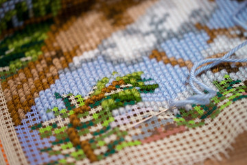 cross-stitch handle is very colorful and tasteful
