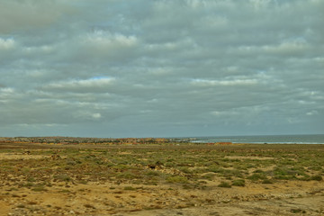  empty mysterious mountainous landscape from the center of the Canary Island Spanish Fuerteventura with a cloudy sky