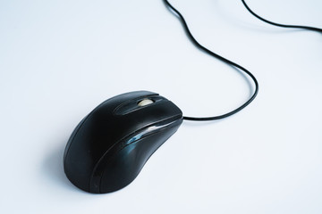 Modern black computer mouse on white background