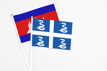 Martinique and Cambodia stick flags on white background. High quality fabric, miniature national...