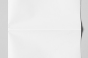 Blank newspaper mockup on a grey backgound.