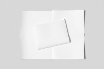 Blank newspaper mockup on a grey backgound.