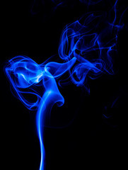 Abstract colored smoke isolated in black background